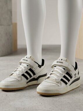 Size 9.5 - Adidas Forum Low White Black.This Items has been gently used.